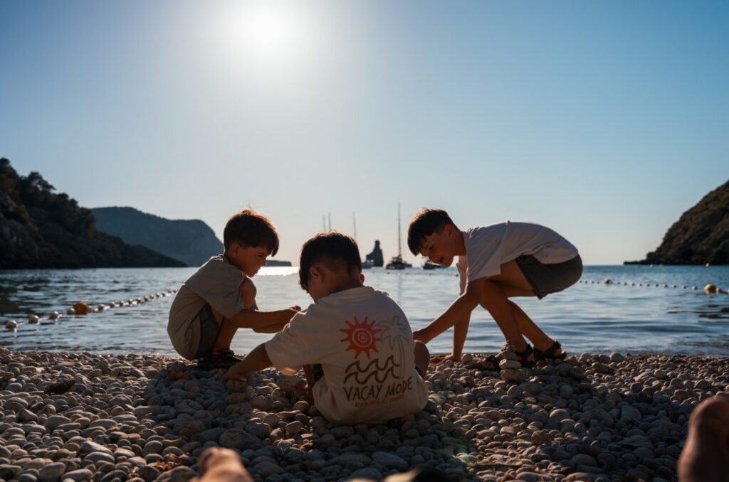 3 boys on a beach in ibiza at sunset
