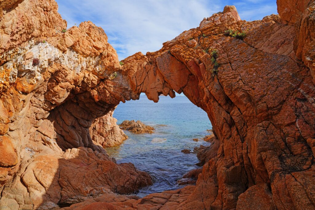 stunning stone arch rock formation in porto cervo